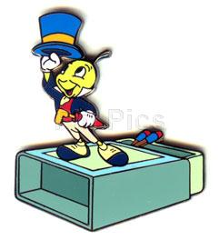 Jiminy Cricket Standing on a matchbox