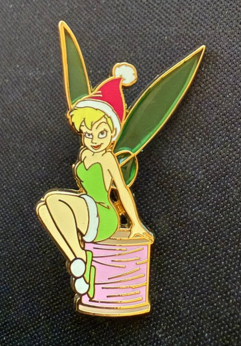 tinker bell sitting on thread.jpg