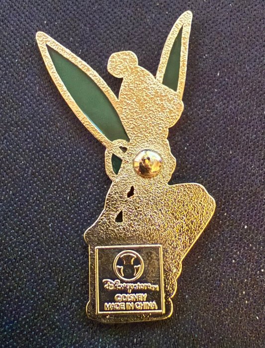 tinkerbell sitting on thread back.jpg