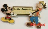 Walt Disney Studio Employee Center - Mickey & Goofy Holding Sign