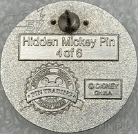 DLR - India - Girl Wearing Yellow Blue Green Beads - Small World - Hidden Mickey 2009